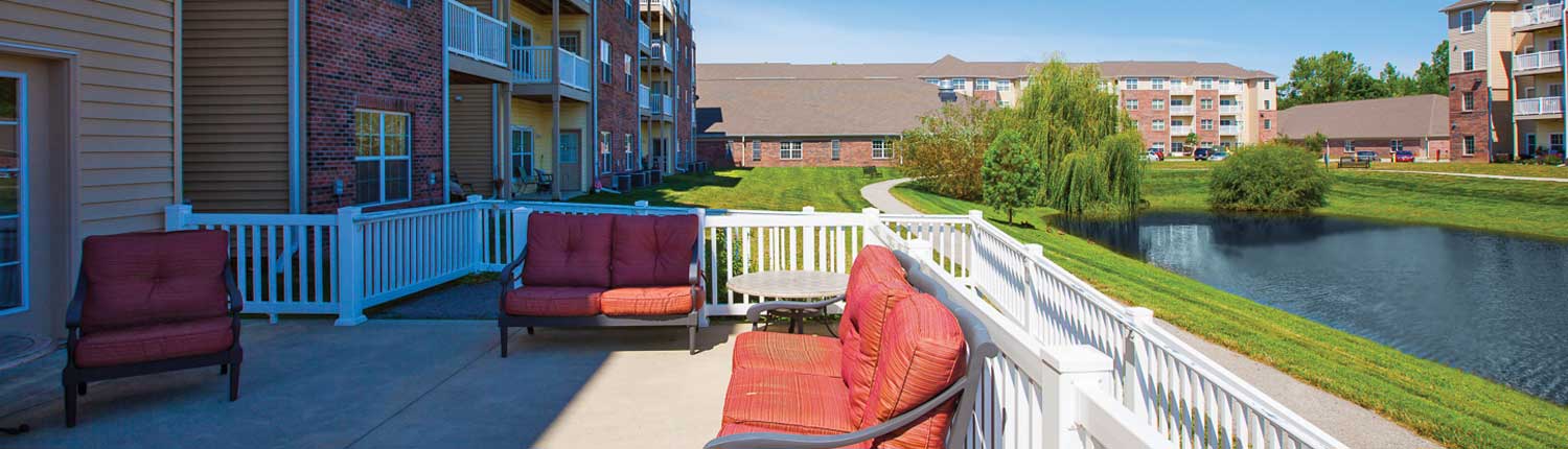 Brookhaven Apartment Community Outside Deck with Pond